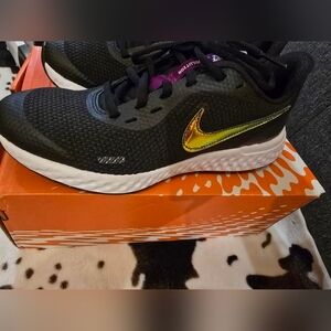 Nike Black and Gold Athletic Shoes